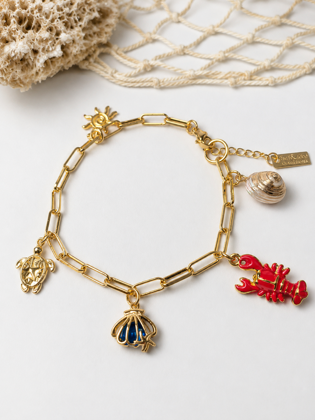 Pulsera Tesoros de la Costa | Pulsera con Dijes Marinos Dorados