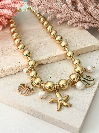 Collar Icacos Dorado con Charms Marinos | Joyería Verano Elegante
