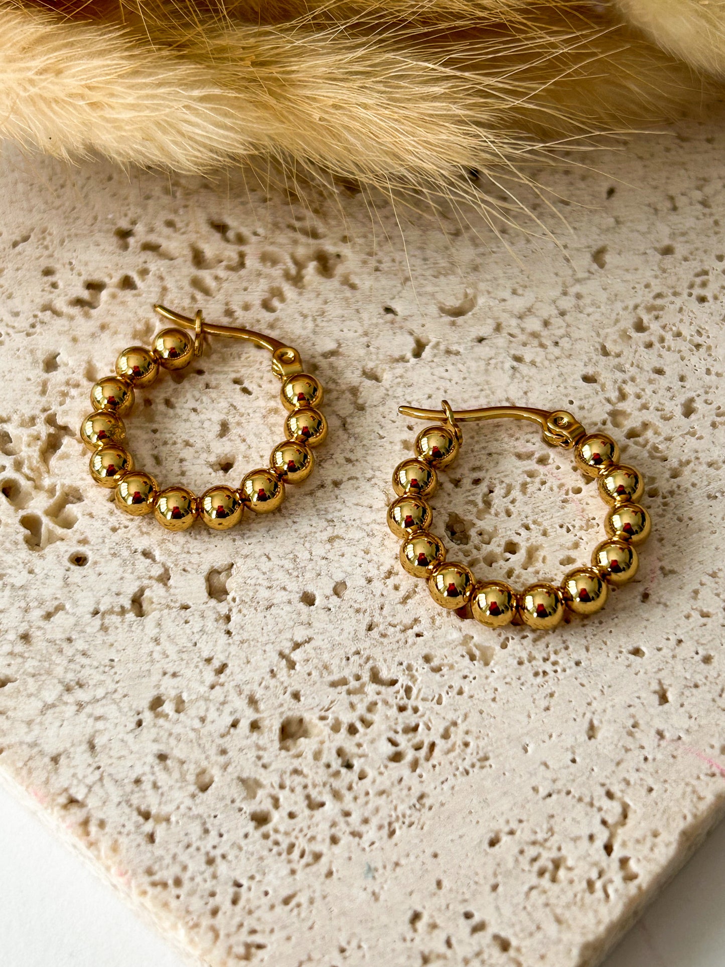 Rounded hoops earrings