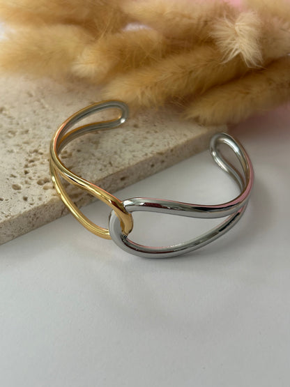 Bangle Doble Tono con Nudo en Acero Inoxidable