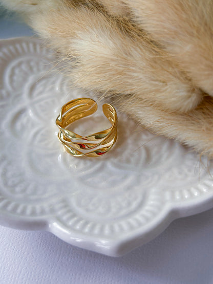 Twisted Ring – Sortija Dorada Ajustable Triple Trenzada