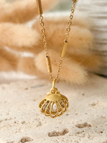 Tesoro del Mar | Collar Dorado con Caracol y Perla