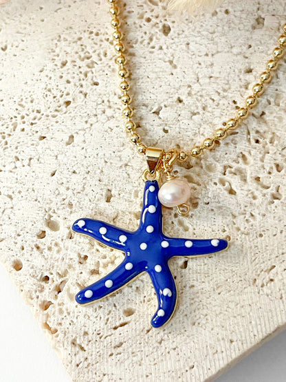 Luceros del Océano | Collar de Estrella de Mar con Perla