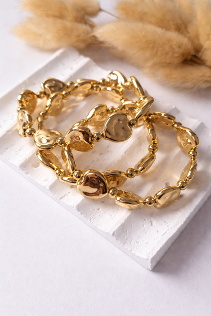 Pulsera Corazones Fluidos | Diseño Orgánico Elegante