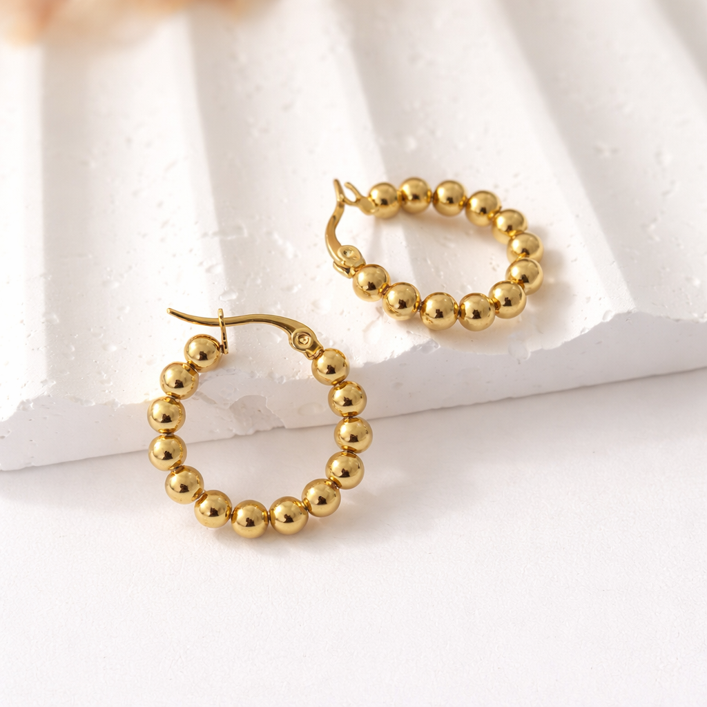 Aretes Halo Dorado de Esferas