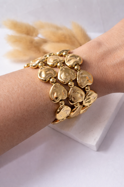 Pulsera Corazones Fluidos | Diseño Orgánico Elegante