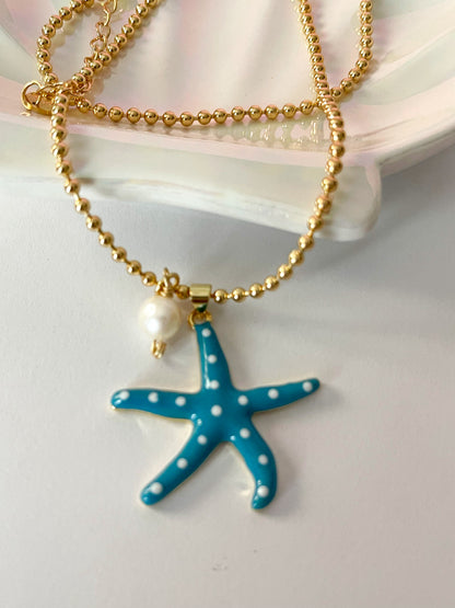 Luceros del Océano | Collar de Estrella de Mar con Perla